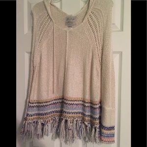 Light tan sweater with fringe